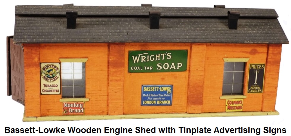 Bassett-Lowke wooden engine shed with tinplate advertising signs
